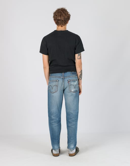 Vintage Levi's 550 33x30 denim jeans in light blue, 3 of 4