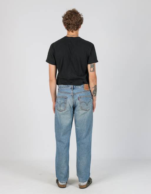 Vintage Levi's 550 33x32 denim jeans in light blue, 3 of 4