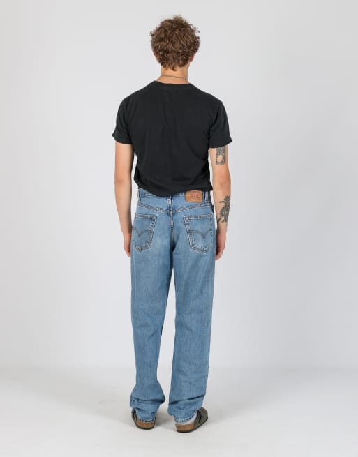 Vintage Levi's 550 33x34 denim jeans in light blue, 3 of 4