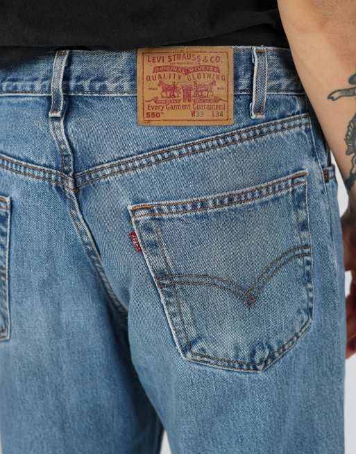 Vintage Levi's 550 33x34 denim jeans in light blue, 4 of 4