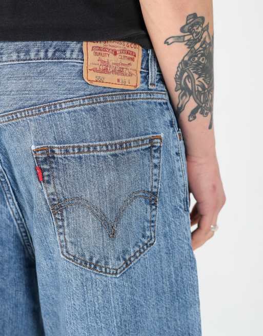 Vintage Levi's 550 36x21 denim jorts shorts in light blue, 4 of 4