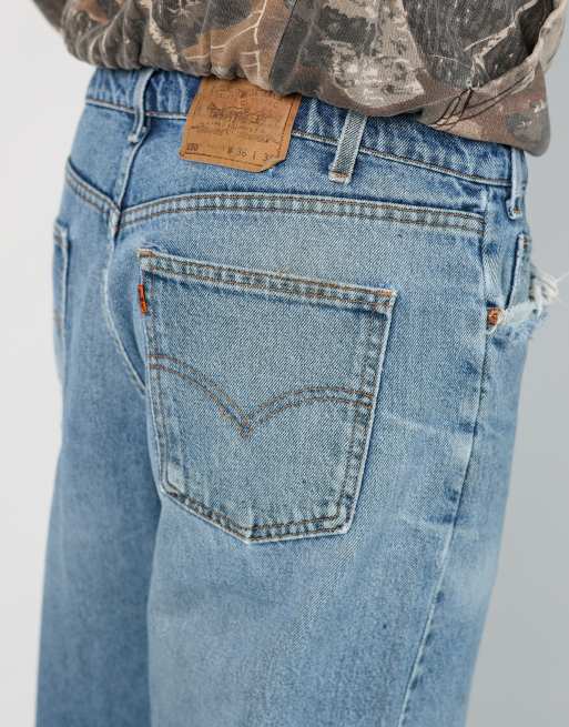 Vintage Levi's 550 36x32 denim jeans in light blue, 4 of 4