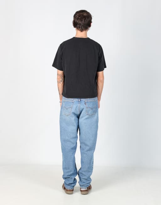 Vintage Levi's 560 34x32 denim jeans in light blue, 3 of 4