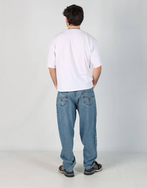 Vintage Levi's 560 36x30 denim jeans in light blue, 3 of 4