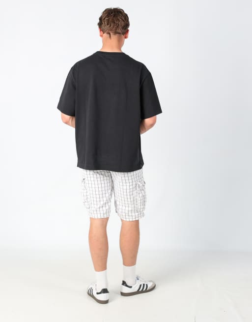 Vintage Levi's plaid 34x22 canvas cargo shorts in cream, 3 of 4