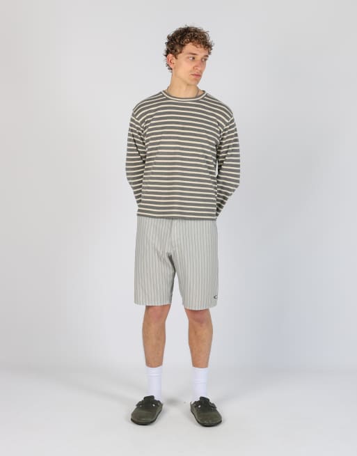 Vintage Oakley stripe 34x20 nylon sports shorts in beige, 1 of 4