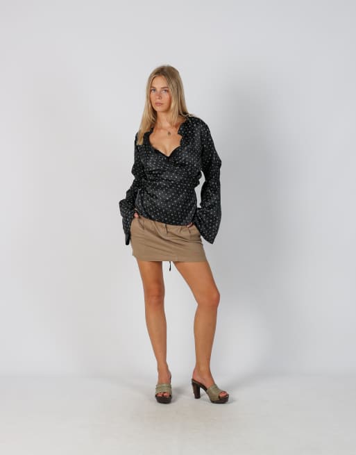 Vintage Pinko 10 woven mini skirt in tan, 1 of 4