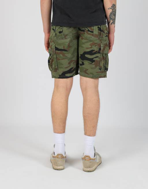 Vintage Quiksilver 30x19 canvas cargo shorts in dark green