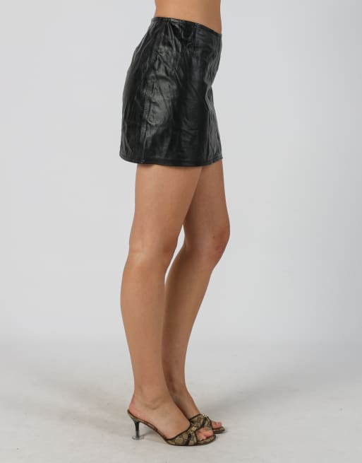Vintage Sisley S leather mini skirt in black, 2 of 4