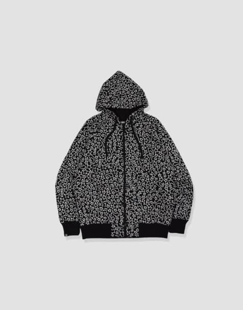 Vintage size S 00s Stussy stars & arrows hoodie in black - view 1