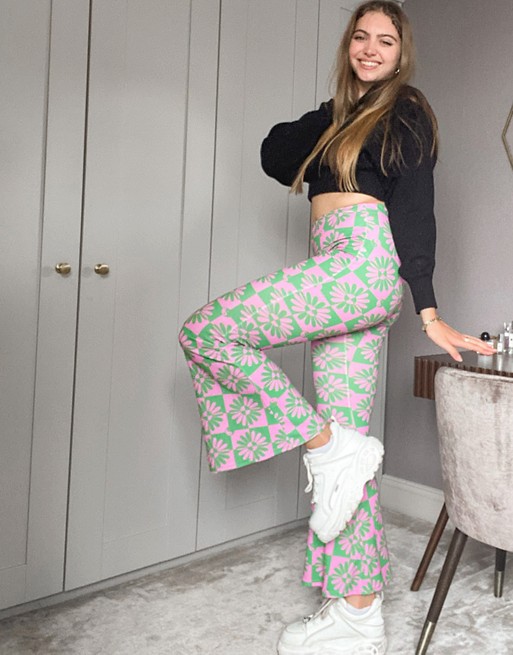 Vintage Supply flare trousers in retro print co-ord