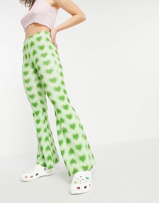 Vintage Supply high waist flare trousers with retro heart print in green