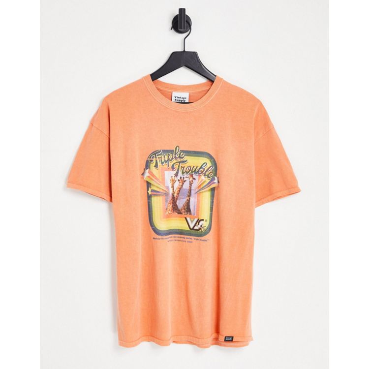 ASOS DESIGN oversized t-shirt in white with orange color block and Los  Angeles city print