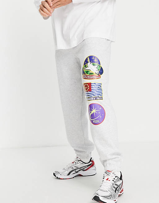 Tracksuits Vintage Supply space patches joggers in grey 