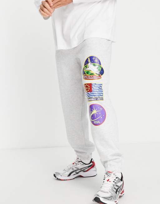 Vintage Supply space patches joggers in grey ASOS