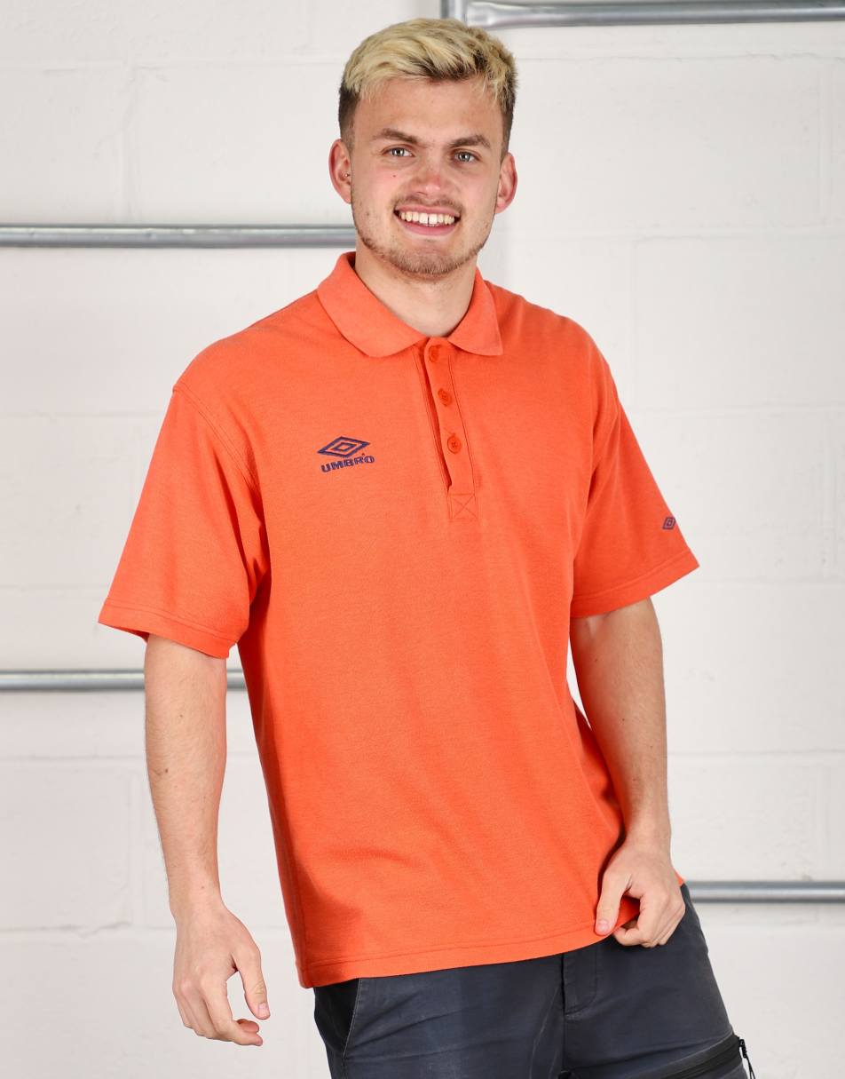 Vintage Umbro Size M short sleeve polo shirt in orange