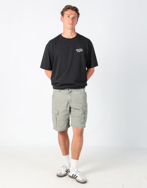 Vintage Wrangler 32x20 canvas cargo shorts in khaki green