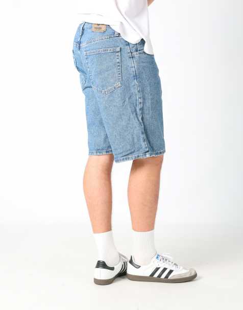 Vintage Wrangler 33x22 denim jorts shorts in blue - view 1