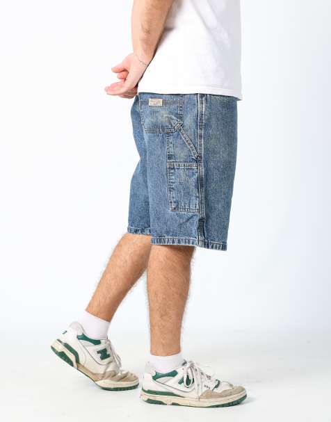 Vintage Wrangler 36x22 denim carpenter baggy jorts shorts in blue - view 1