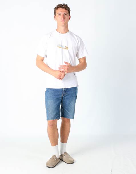 Vintage Wrangler 38x23 denim jorts shorts in blue - view 1