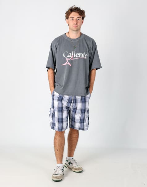 Vintage Wrangler plaid 34x22 canvas cargo shorts in blue - view 1