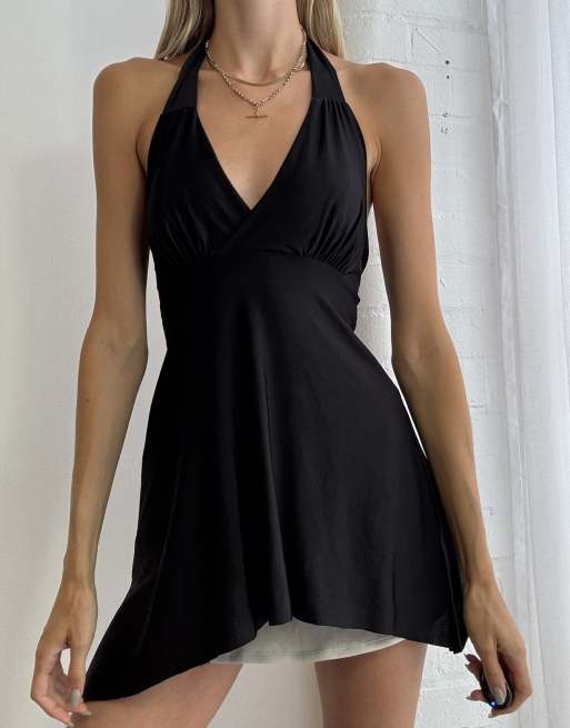 Vintage y2k halter neck top with asymmetric hem size s in black