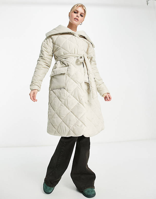 VIOLET ROMANCE - quilted shawl neck longline coat with belt in stone