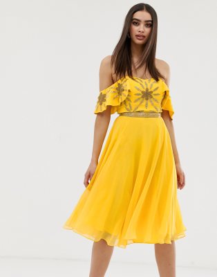 yellow embellished top