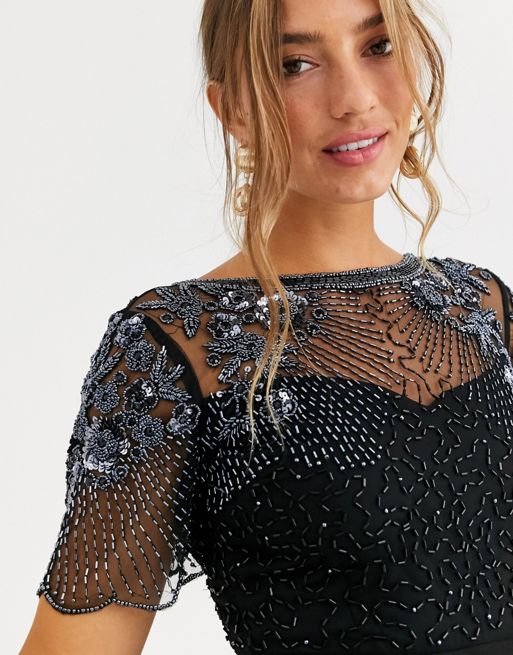 Introduction to the Black Lace Overlay Dress