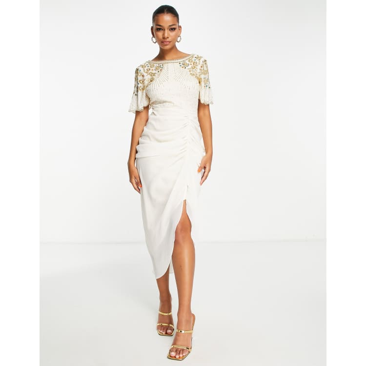 Vestito dorato clearance e bianco