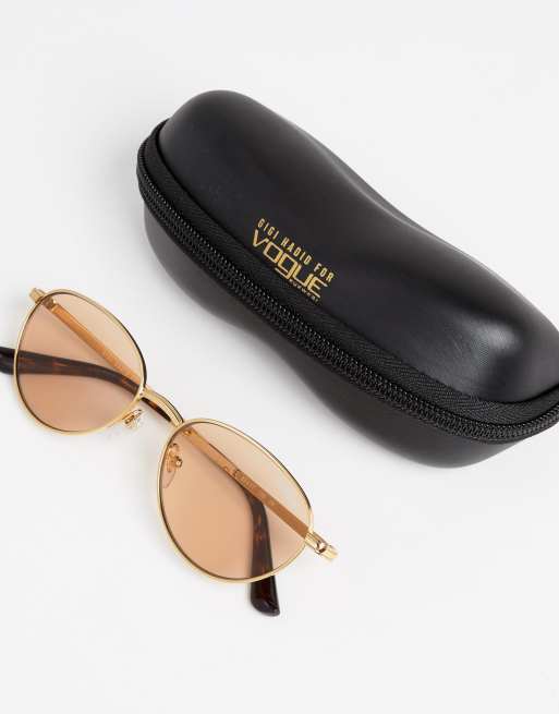Vogue Eyewear round sunglasses by gigi hadid in gold | ASOS display picture 3