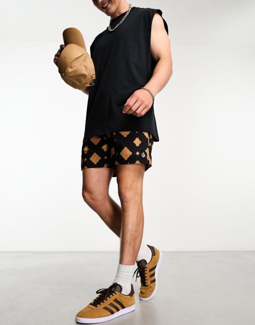 Volcom - Pantaloncini neri e oro con stampa mandala in coordinato