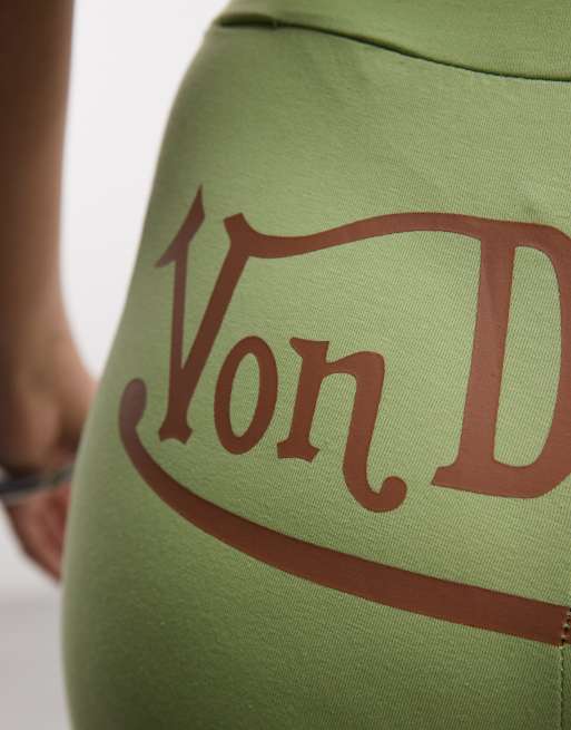 Von Dutch low rise flare trousers with bum graphic in lime green, 5 of 5