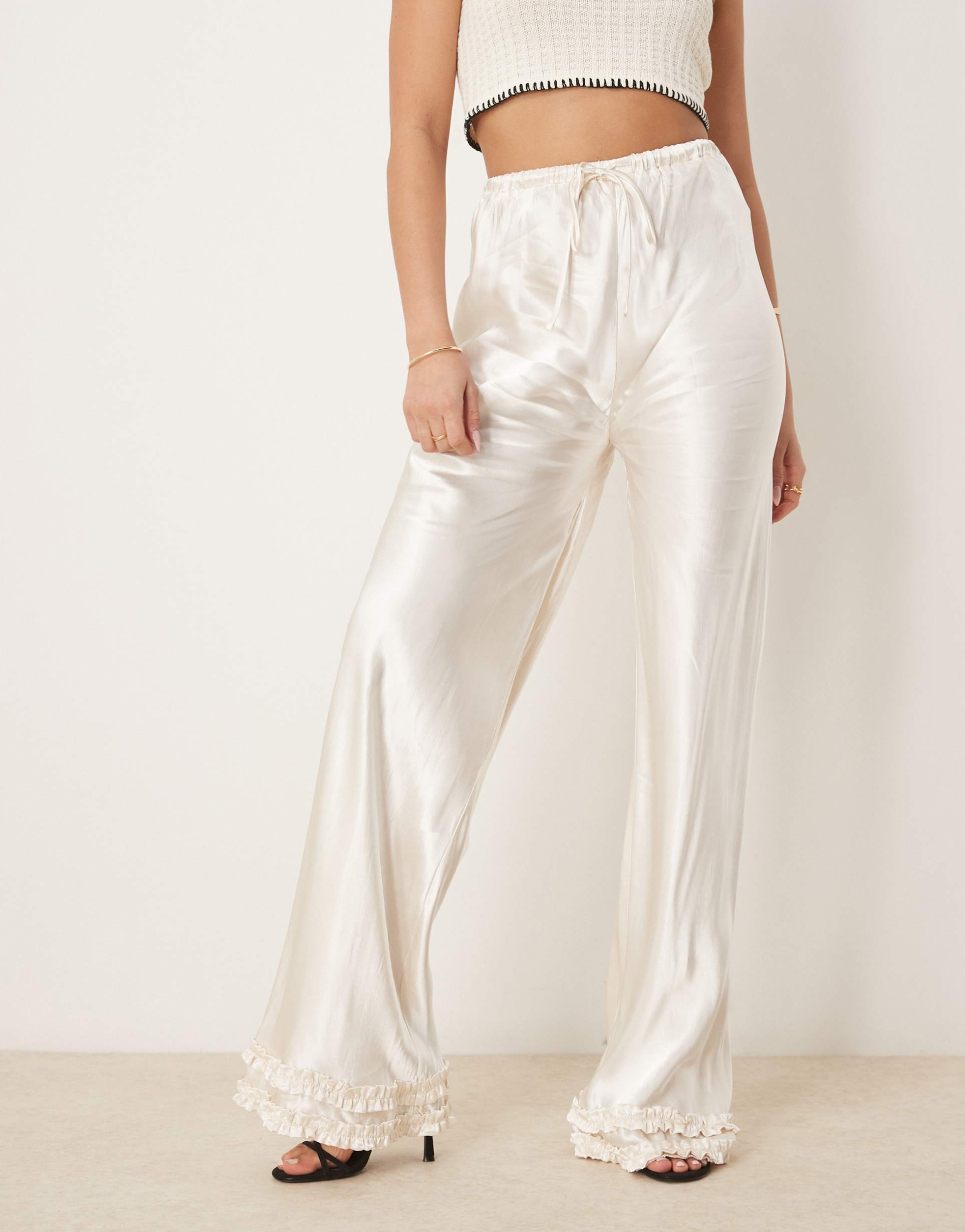 vrg grl citara satin pants with hem detail in white