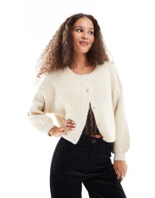 elsie fluffy ribbed knitted cardigan in cream-White