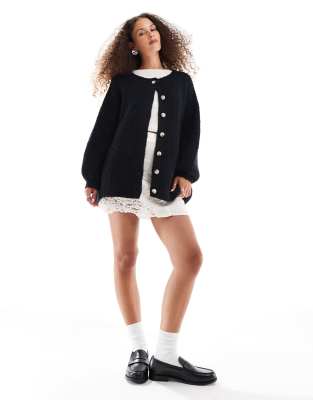 penelope fluffy longline cardigan in black