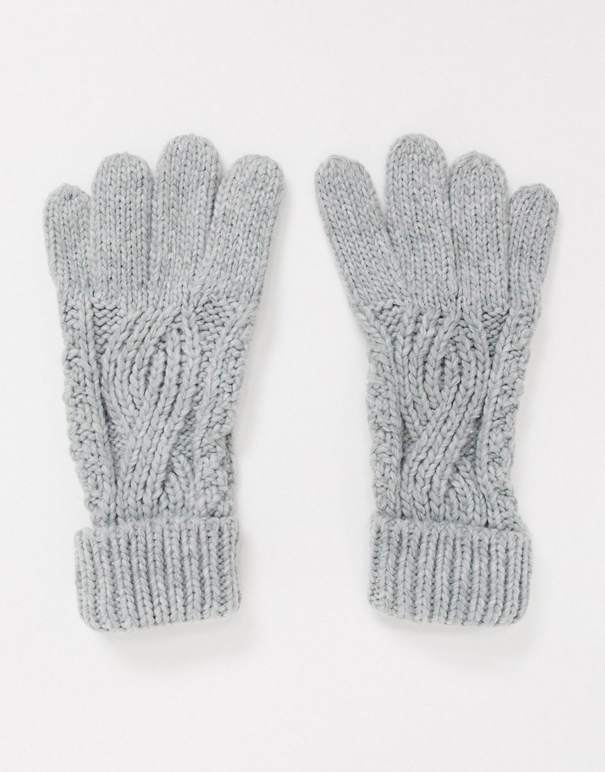 фото Вязаные перчатки с отворотом и узором «косичка» серого цвета boardmans-серый