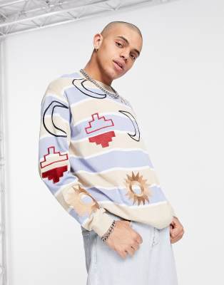 фото Вязаный джемпер в стиле oversized в полоску с вышитыми узорами asos design-голубой