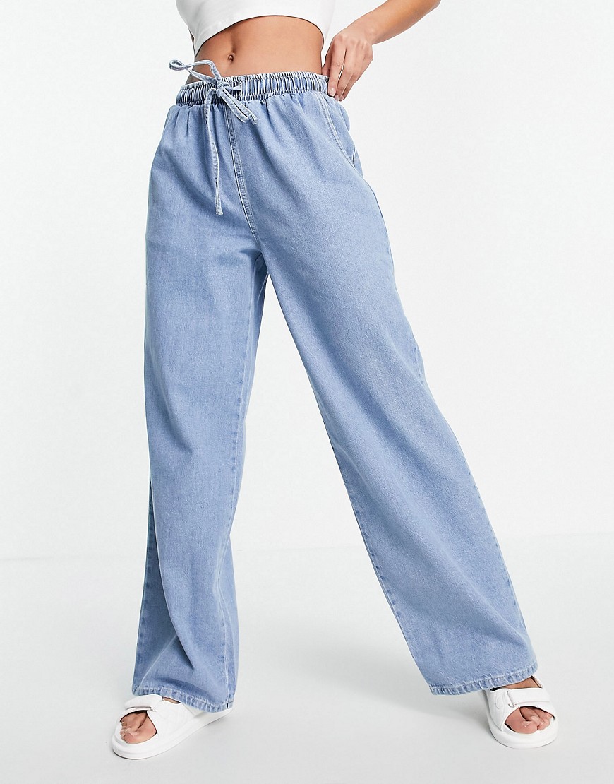Выбеленные джинсы с резинкой на поясе ASOS DESIGN-Голубой