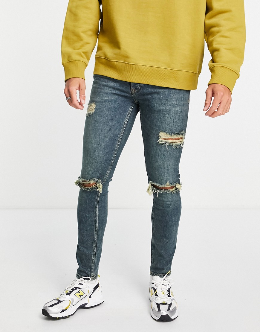 фото Выбеленные эластичные зауженные джинсы с зеленым тонированием и рваной отделкой topman-голубой