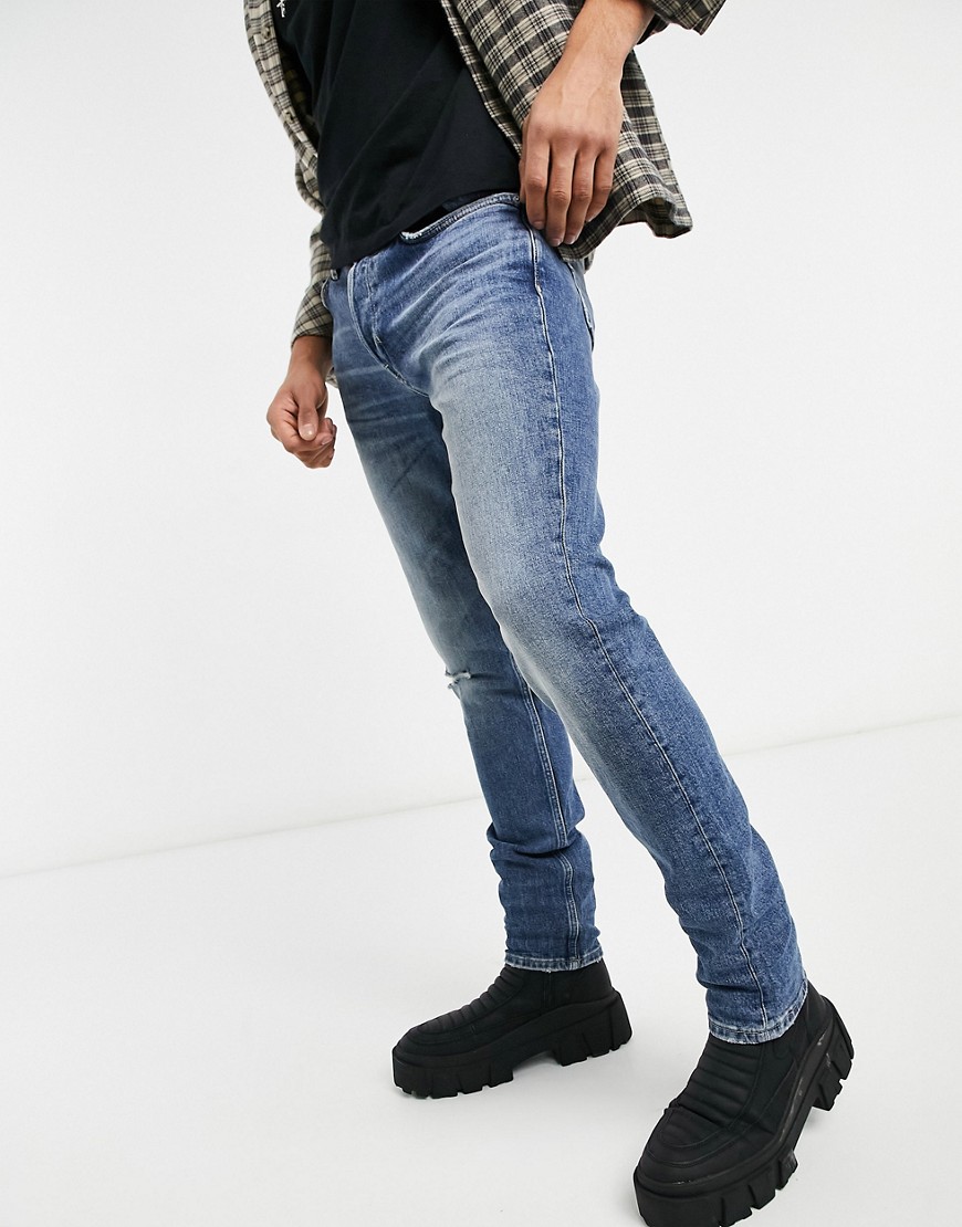 фото Выбеленные суженные джинсы с рваным дизайном bellfield-серый