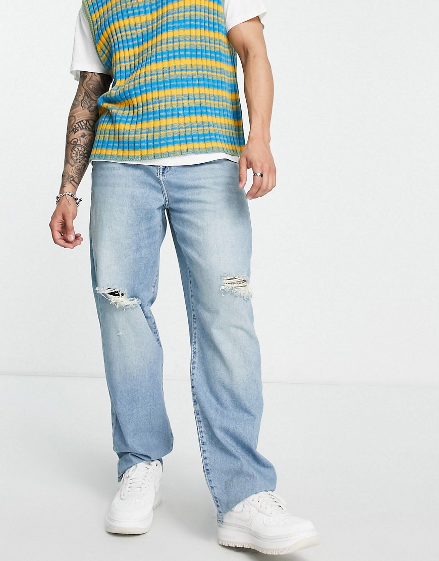 фото Выбеленные тонированные джинсы свободного кроя со рваной отделкой на коленях asos design-голубой