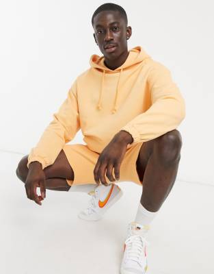 фото Выбеленный оранжевый oversized-худи asos design-оранжевый цвет