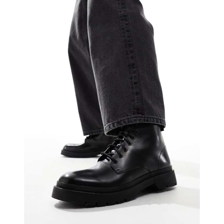 【関税込み】Chunky Sole Lace-Up Boots in Black Leather Black Lace-Up Chunky Ankle Boots - CHARLES & KEITH ES
