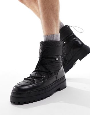 Element snow boots in black leather