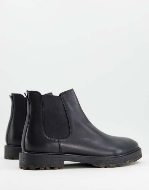 Walk London – James – Svarta chelseaboots i läder med kamouflagemönstrade sulor