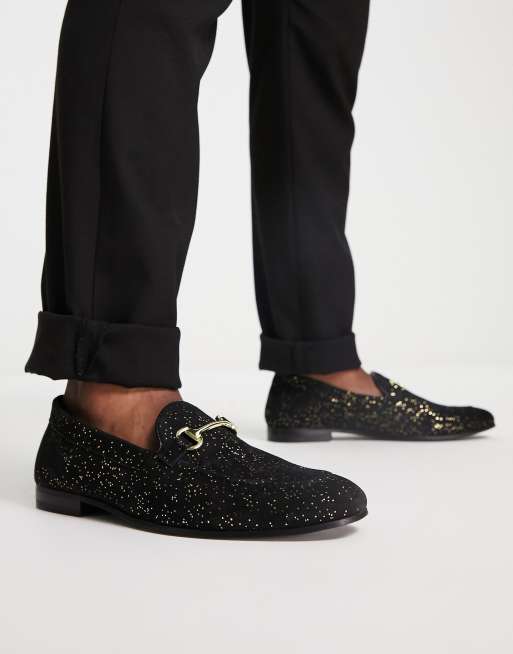 Walk London – Jean – Svarta, glittriga loafers med metalldetalj 