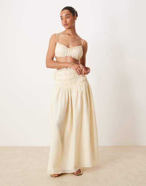 Wander Doll - Soulie - Maxi rok met linnenlook, gesmokte verlaagde taille en strikdetail in beige, deel van co-ord set - view 1