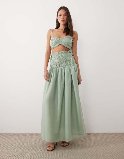 Wander Doll - Soulie - Maxi rok met linnenlook, gesmokte verlaagde taille en strikdetail in saliegroen, deel van co-ord set - view 1