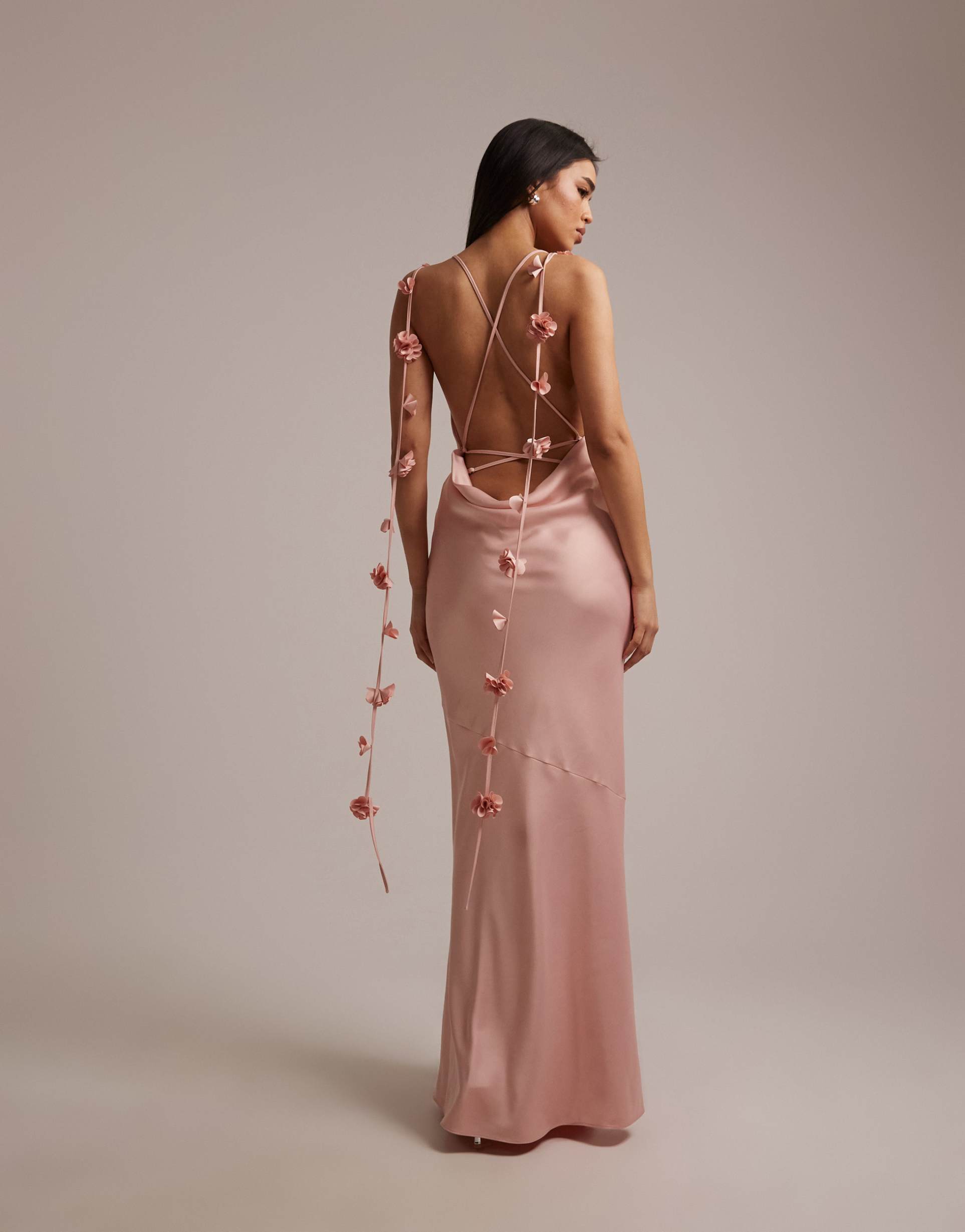wanderdoll aria bridesmaid satin cowl neck draped bow detail cross back maxi dress in baby pink